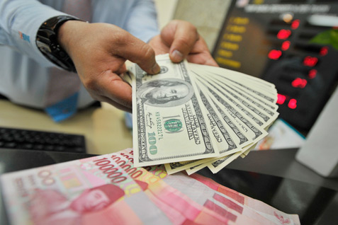 Rupiah Sentuh Level 14.735 Per Dolar AS